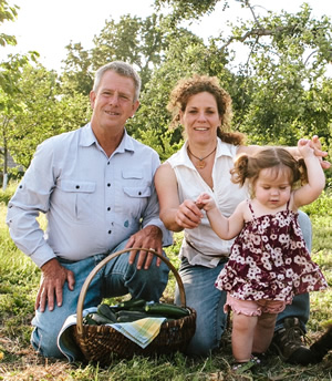 Bart Hall and Margit Kaltenekker Hall pose for a picture with their daughter Roosmarijn in 2013. Photo courtesy of Margit Kaltenekker Hall.